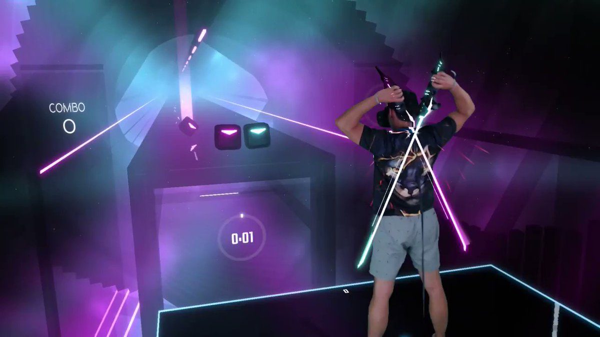 A guy playing Beat Saber