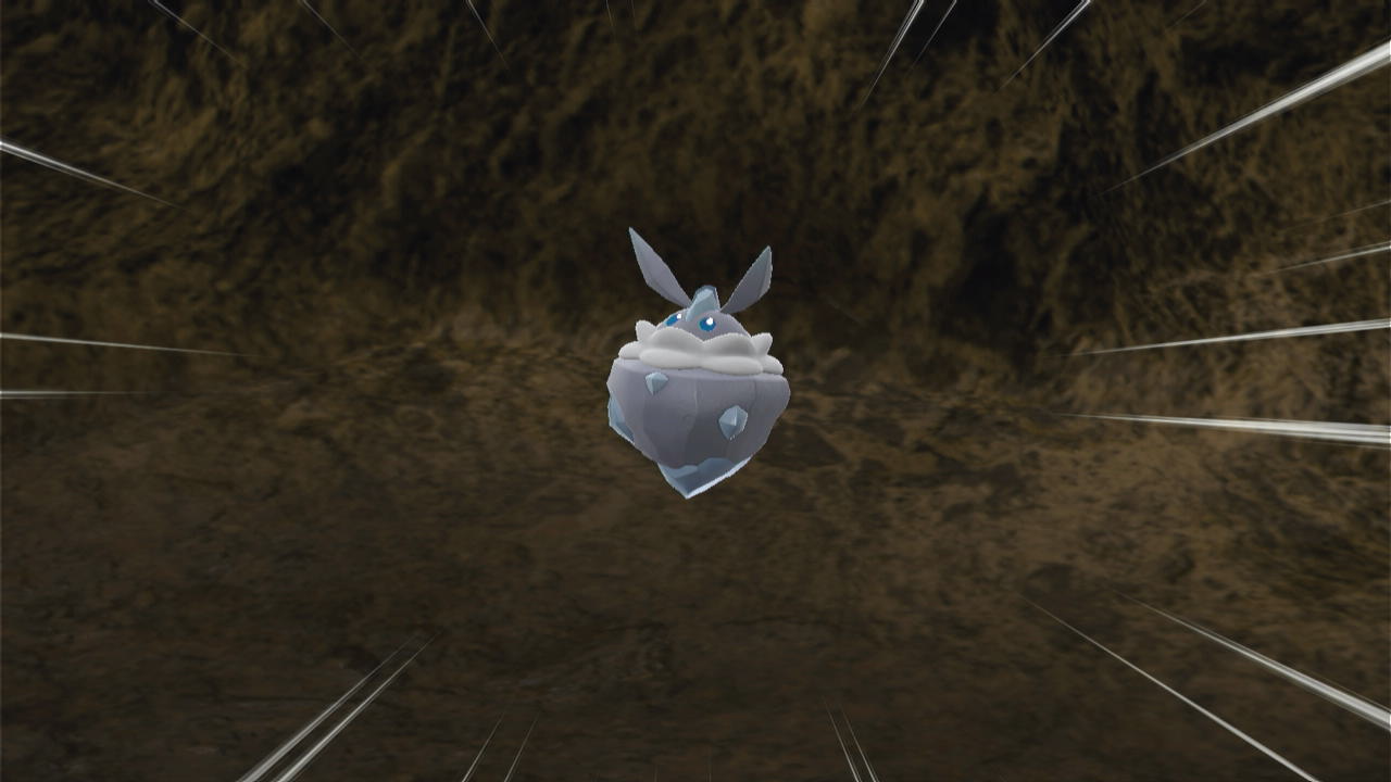 A screenshot of the Pokémon Carbink inside Oni Cave in Scarlet and Violet's The Teal Mask DLC.