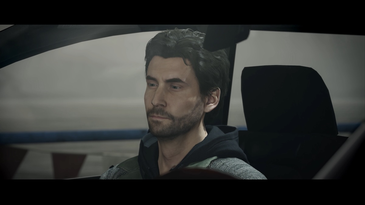 Alan Wake in car in Alan Wake Remastered.