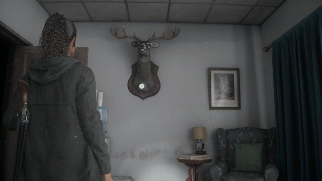 Suomi Hall deer head in Alan Wake 2.