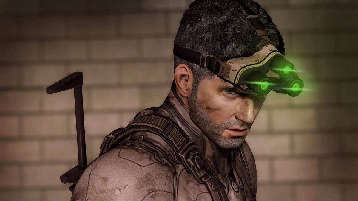 Splinter Cell: a well-lit Sam Fisher wearing his trademark night vision goggles on his head.