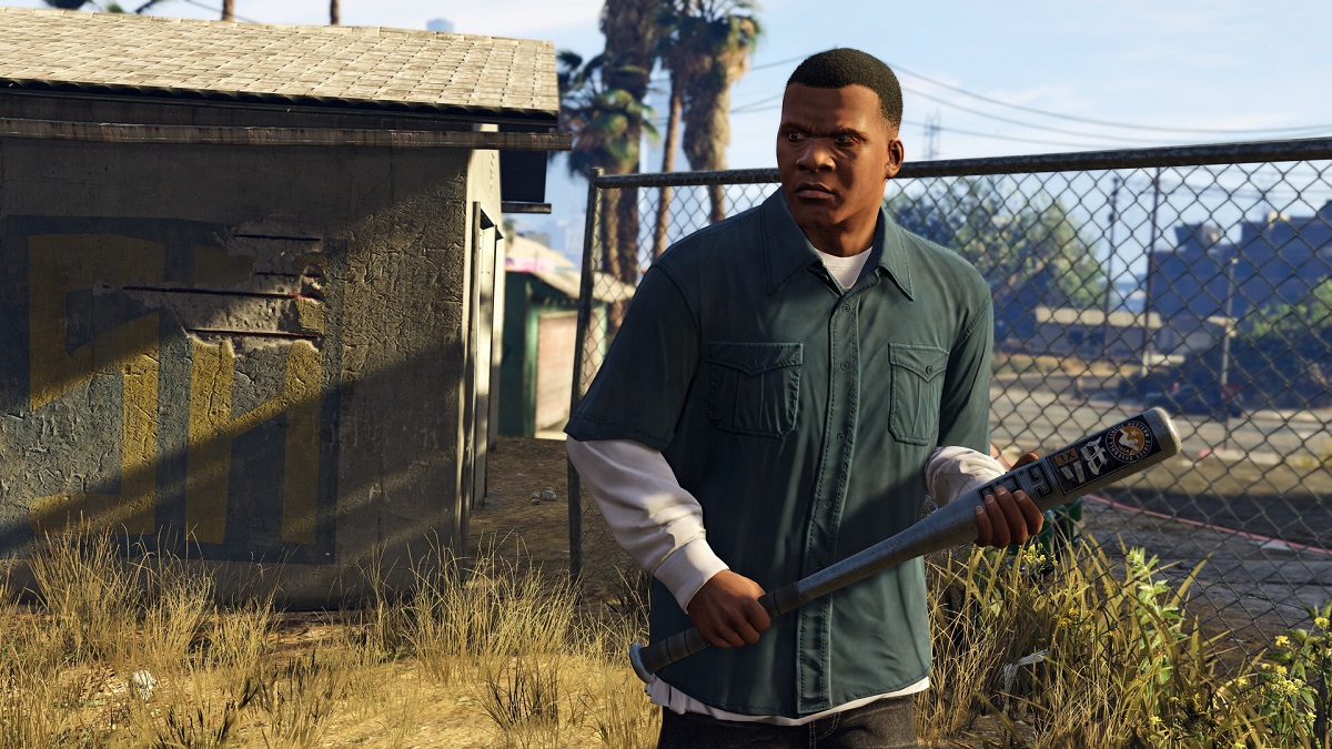 GTA 5: Franklin holds a bat in a small field.