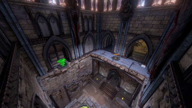 Quake Champions: a high view of a gray, church-like arena, with items scattered about the place.