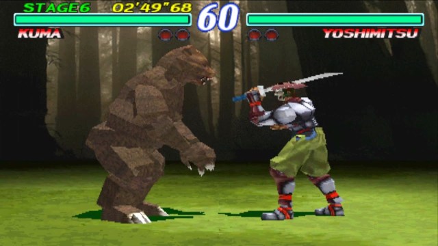 Tekken 2: Yoshimitsu and Kuma the bear fight in a dark forest.