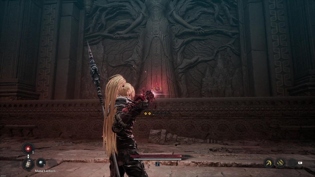 The third Soulsstone in Embars Ruins in front of a bas relief