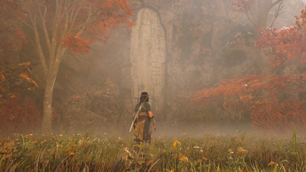 Assassin's Creed Shadows screenshot of the Kuji-kiri location: Cliffside Buddha.