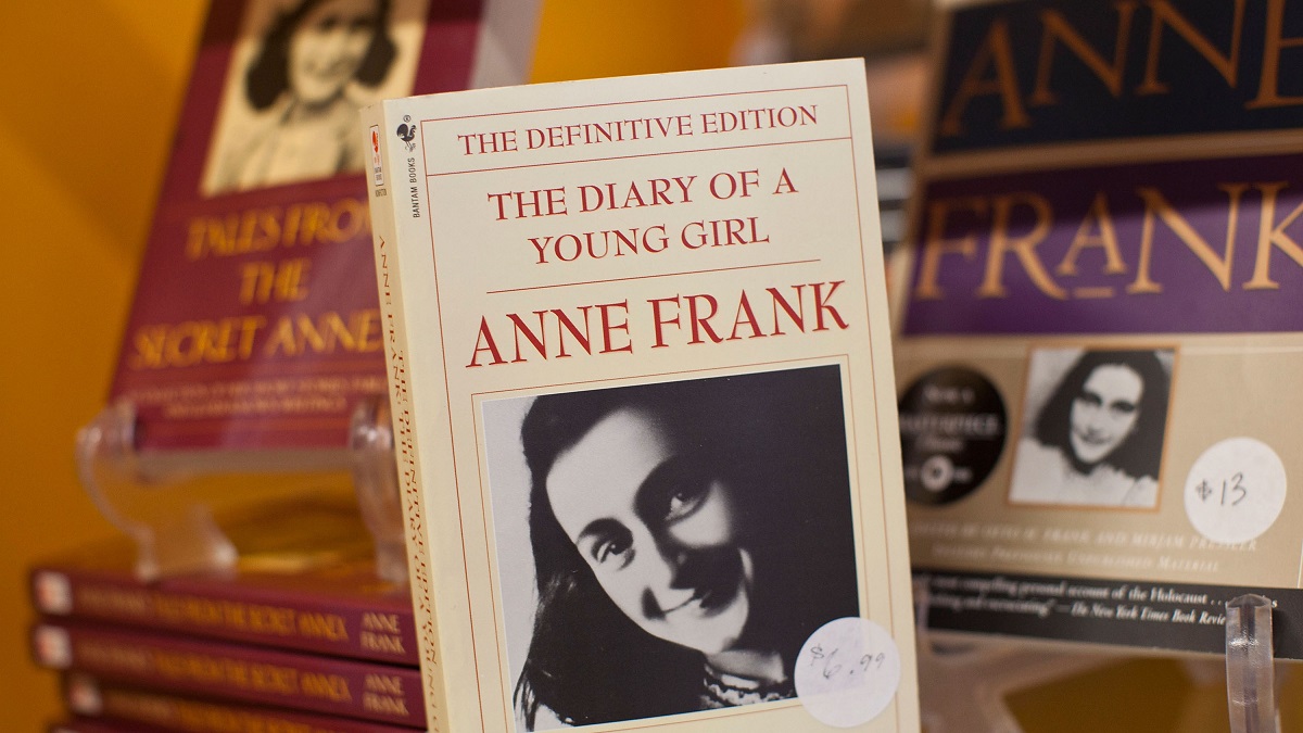 Banned books: the cover of Ann Frank's diary, with a black and white photo of Anne herself on the front.