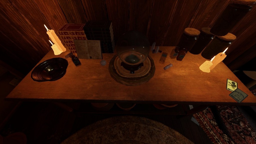 Phasmophobia: a close-up of an occult table in the attic of Bleasdale Farmhouse.