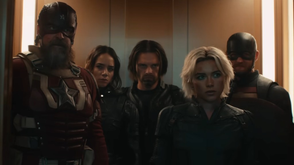 Five of the Thunderbolts including yelena, ghost, bucky, red guardian, and us agent standing in an elevator in Marvel's Thunderbolts film.