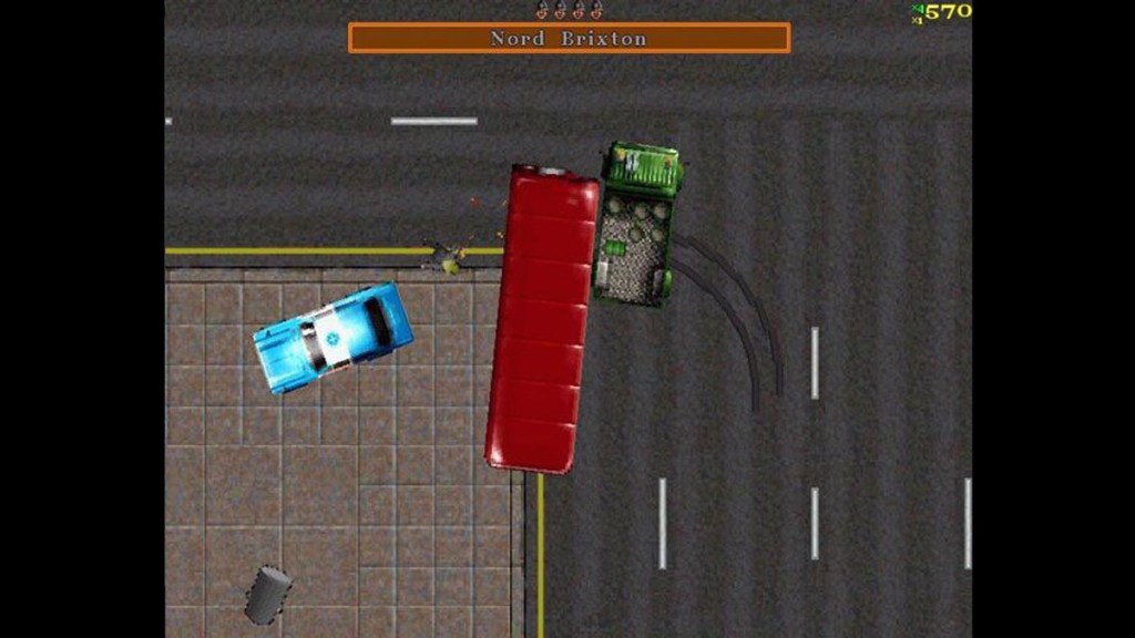 A red bus hitting a dumpster track