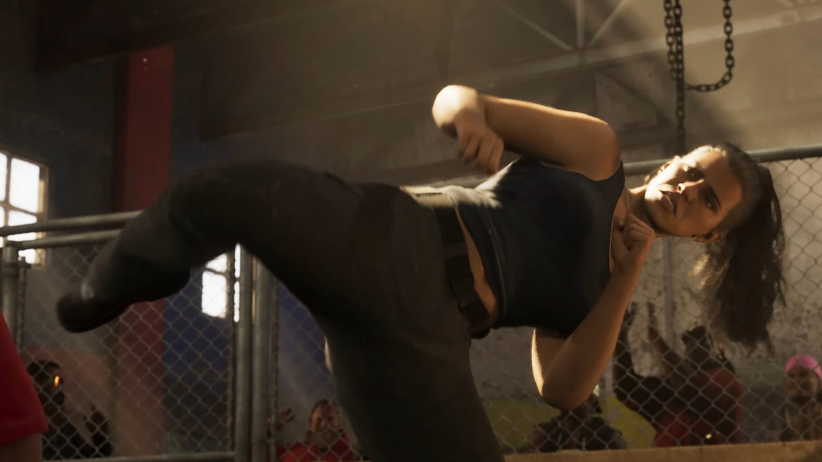 Lucia kicking in a fighting ring