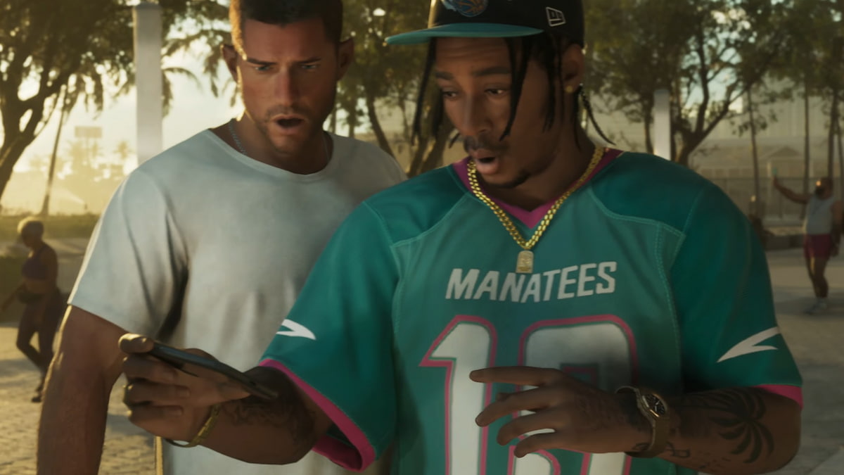 NPC wearing Manatees jersey next to Jason