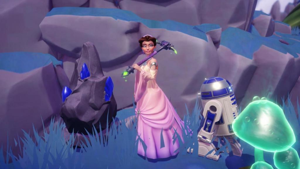 Holding a Pickaxe by a rock node with blue Gems sticking out of it in Disney Dreamlight Valley