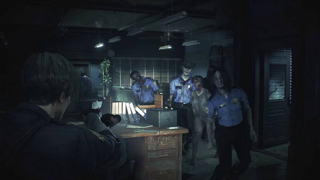 Resident Evil 2 remake screenshot of Leon aiming at zombie cops