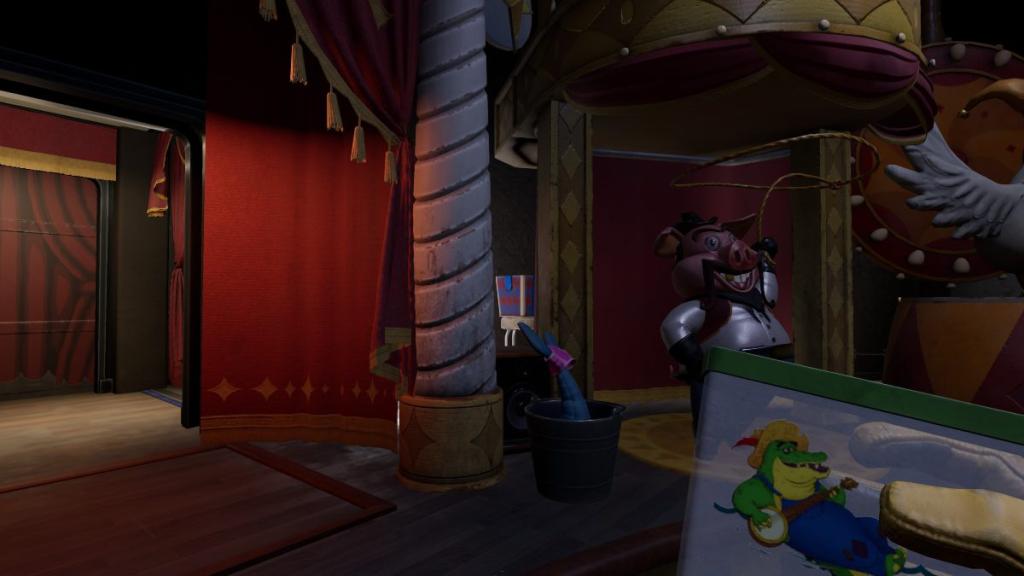 Present behind cowboy pig, next to Showroom door in Welcome Show