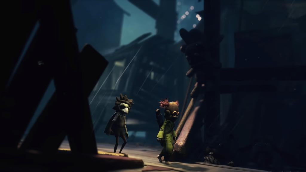 Two characters, low and alone, walking outside through the rain in little nightmares 3