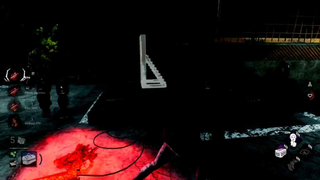 An animatronic with a massive knife in his hand chasing a woman around a stairwell in Dead by Daylight. 