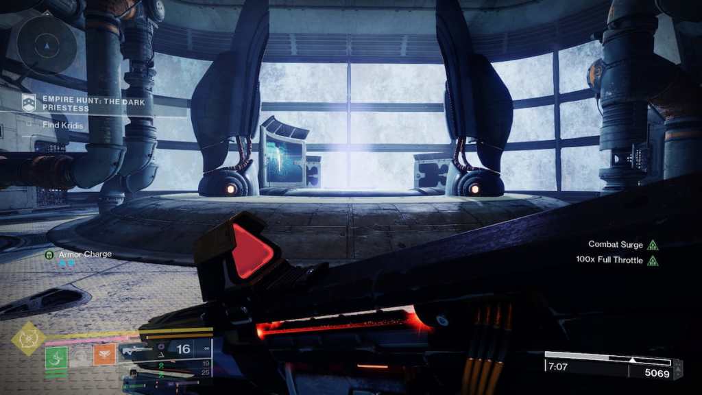 A guardian stands in front of a Fallen teleportation device.