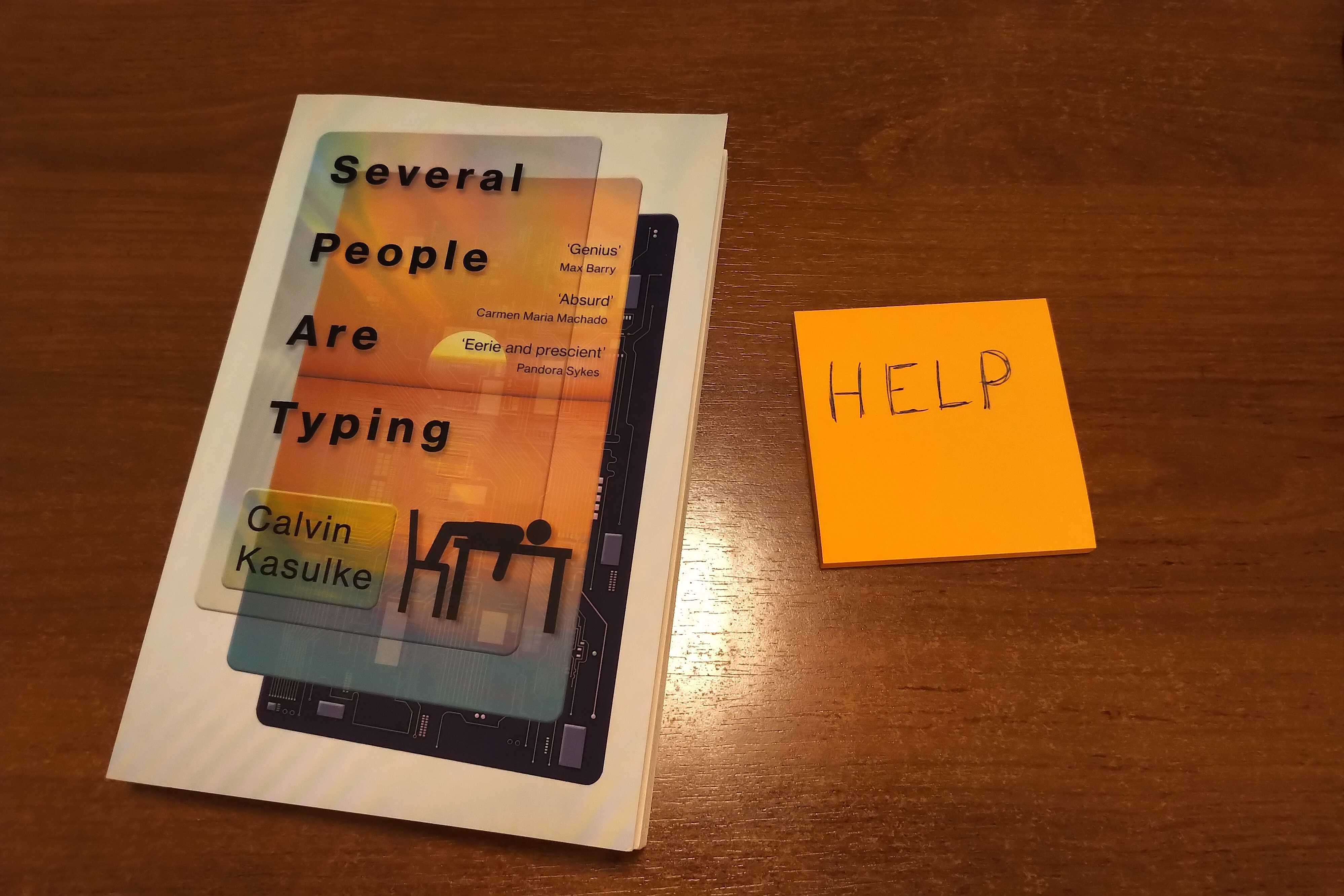 several people are typing book cover