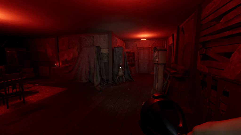 Looking at a small child ghost in a room lit by red light at grafton farmhouse in phasmophobia
