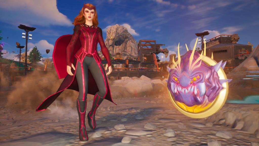Scarlet Witch walking by a Medallion on the ground in Fortnite