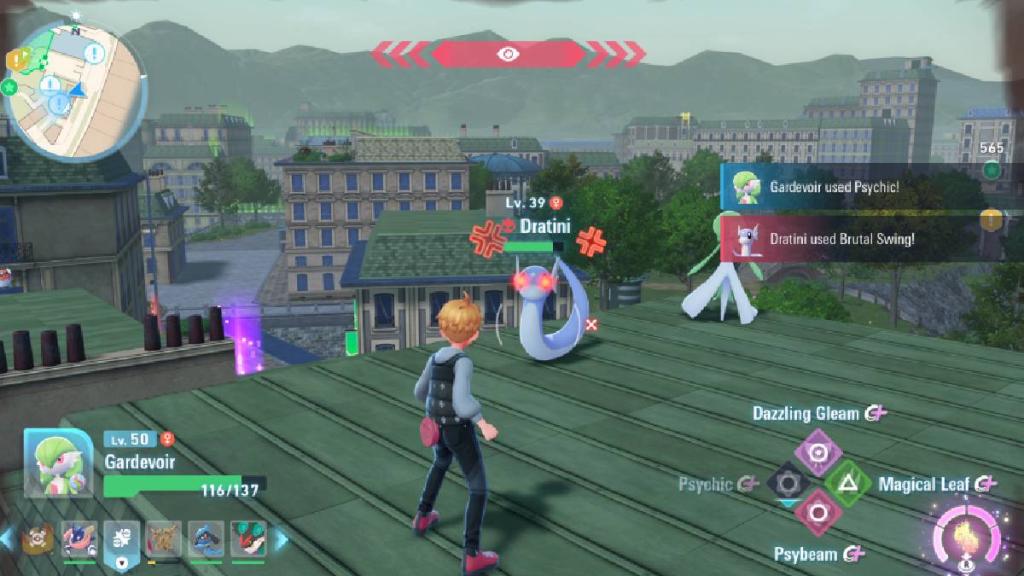 A trainer approaches an Alpha Dratini