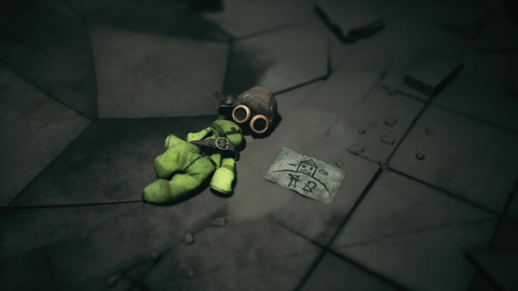 Alone's clothes with Low's map of his home beside the cloth