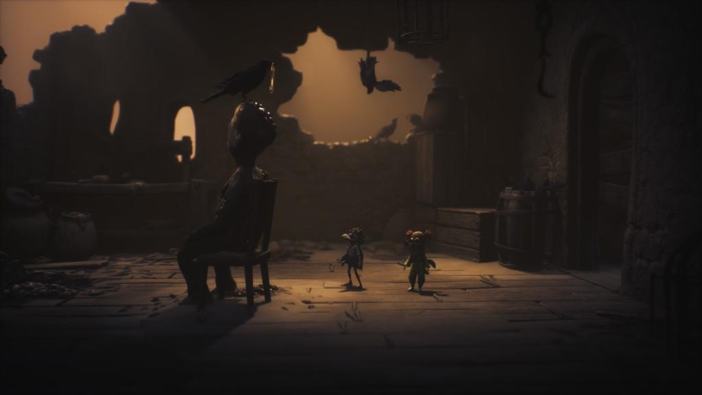 Alone and Low looking at a crow atop a statue, holding a key