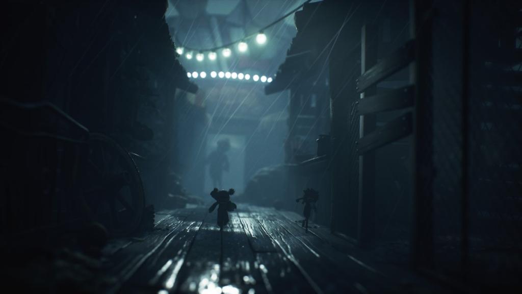 Running from The Kin, a out of focus monster in the background