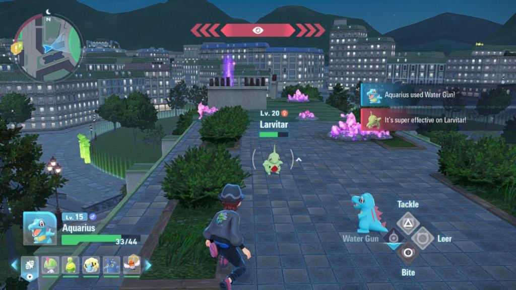 A trainer and their Totodile battling a Larvitar in Pokemon Legends ZA.