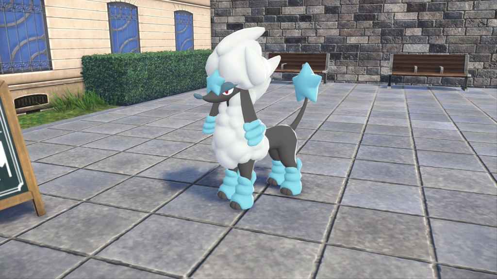 A poodle-like creature, called a Furfrou, with white floof and blue star-shaped designs in its fur.
