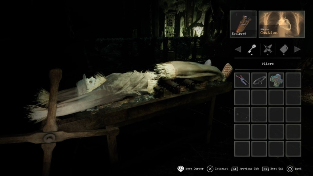 Spinning the wheel on the torture device to pull apart the scarecrow on the table