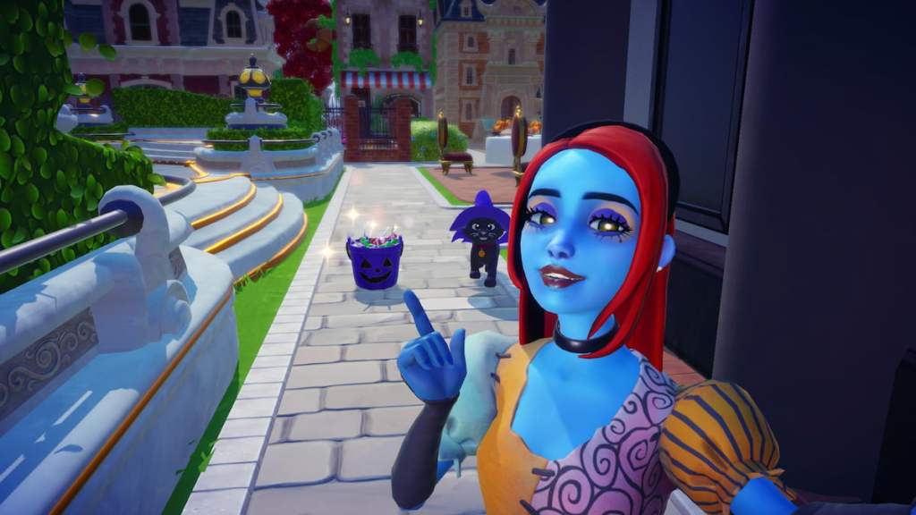 pointing at blue candy bucket in disney dreamlight valley