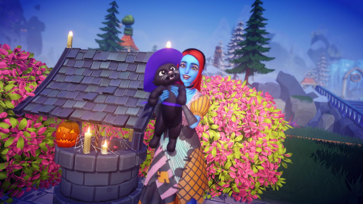 A player with red hair, blue skin, and a patchwork dress holding a black cat with a purple witch hat by a haunted well in disney dreamlight valley