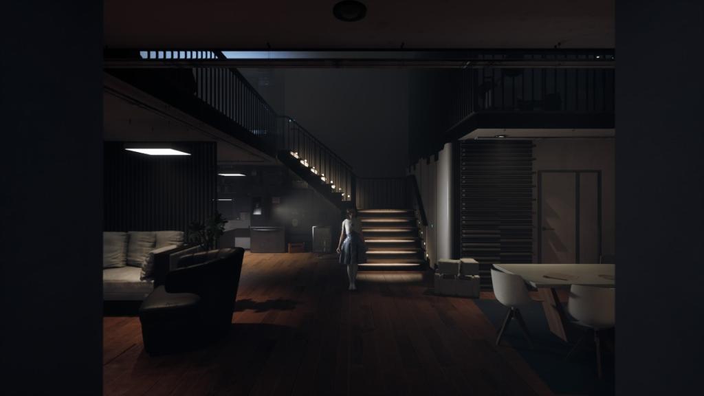 AIDA standing in Samuel's apartment