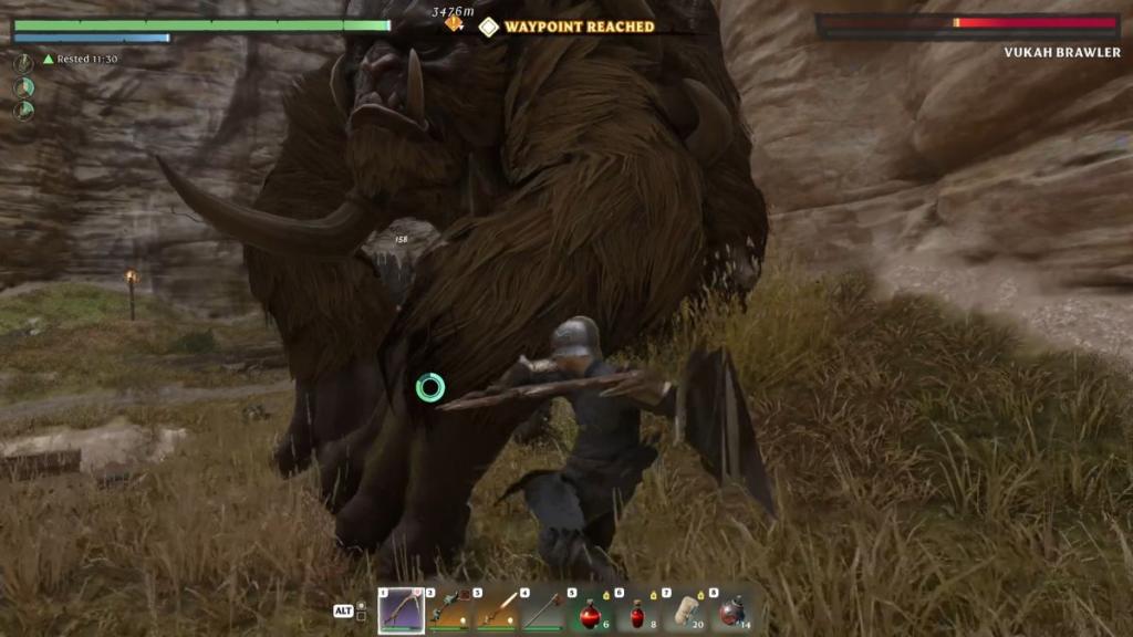 A player fights a Vukah Brawler in Enshrouded.