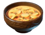 A bowl of orange and yellow curry. This is the Taro Root Curry in Enshrouded