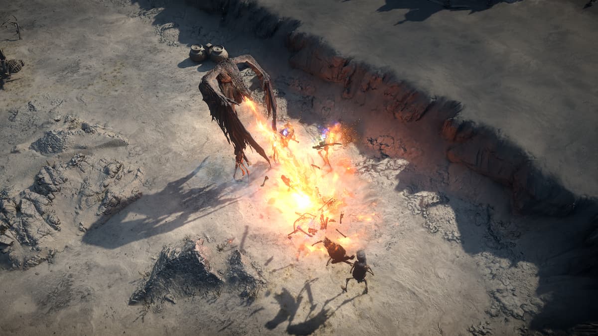 Players defeating an enemy in Path of Exile 2