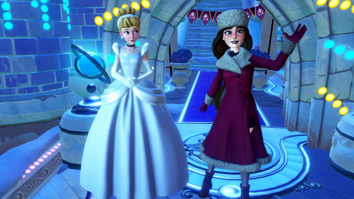 Standing next to Cinderella in front of the Dream Castle in disney dreamlight valley
