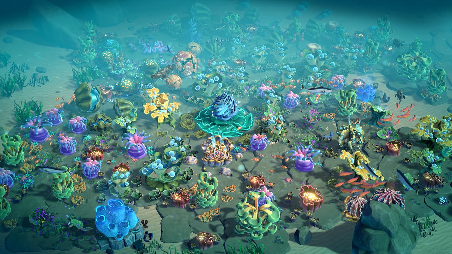 A screenshot from Life Below showing a bunch of colorful coral reef buildings